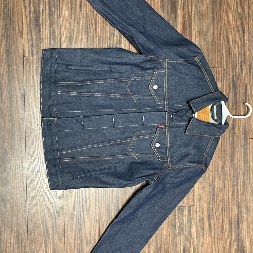 Size medium Levi Jean jacket, a darker navy